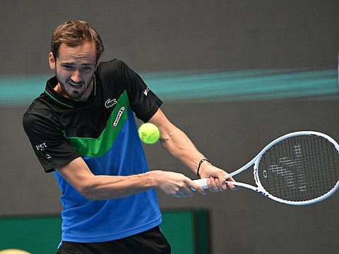 Russias Daniil Medvedev hits a return against Frances Ugo Humbert during their China Open men's singles quarter-final match in Beijing on October 2, 2023. (Photo by Jade Gao / AFP)