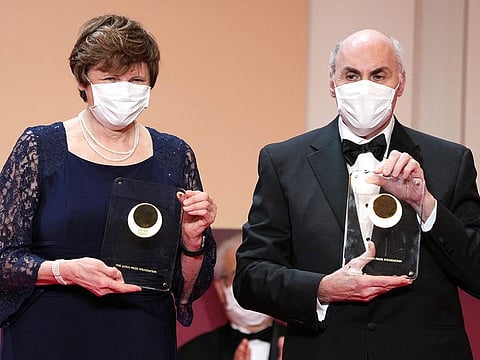Japan Prize 2022 Laureates Hungarian-American biochemist Katalin Kariko (L) and American physician-scientist Drew Weissman pose with their trophy during the Japan Prize presentation ceremony in Tokyo on April 13, 2022. Katalin Kariko (Hungary) and Drew Weissman (US) have won the Nobel Medicine Prize for mRNA vaccine research, the Nobel committee announced on October 2, 2023 in Stockholm. 