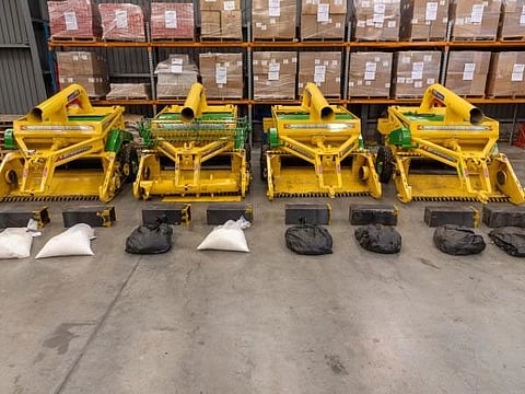 Bags of methamphetamine seized from a 'wheat harvesting machines' shipment.