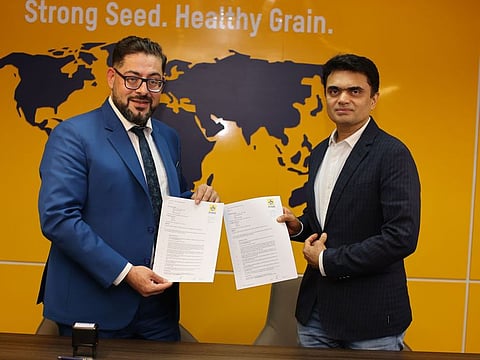 Dr Khaled Raed from PETKUS MENA and Yasin Ranani from Al Amir Food signing the contract