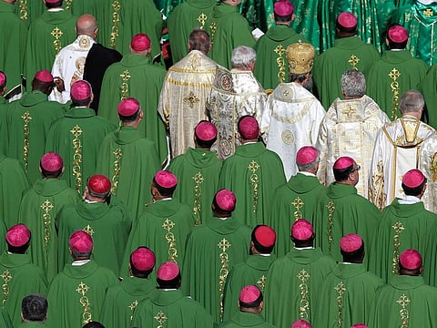 Bishops attend a Mass celebrated by Pope Francis for the opening of a synod, a meeting of bishops, in St. Peter's Square, at the Vatican, Wednesday, Oct. 3, 2018.