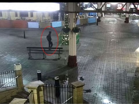 Jaswant Singh Chail is seen walking in Windsor Town Centre in the early hours of December 25, 2021 in this still image obtained from CCTV footage.
