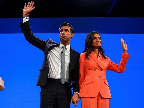 File photo: British Prime Minister Rishi Sunak and his wife Akshata Murty greet people on stage, at Britain's Conservative Party's annual conference in Manchester, Britain, October 4, 2023.