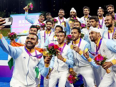 Indian Men's Hockey Team players pose for a selfie showing their Gold medals after beating Japan 5-1 in the men's hockey final match in the Asian Games, at the Gongshu Canal Sports Park Stadium in Hangzhou on Friday. 