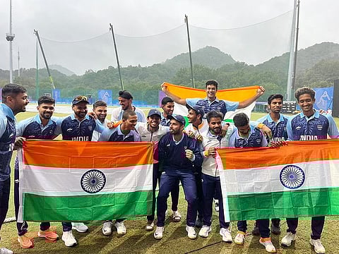 Indian team members pose with the Asian Games gold after defeating Afghanistan in men's final  in Hangzhou on Saturday. Cricket is set to be part of the Los Angeles Olympics 2028.