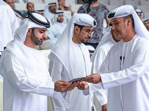 Sheikh Mansoor bin Mohammed bin Rashid Al Maktoum (left), Chairman of the Dubai Border Security Council, at Al Ameen Forum for security held in Dubai on Monday