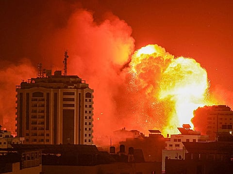 A fireball erupts from a massive Israeli airstrike in Gaza City on Monday
