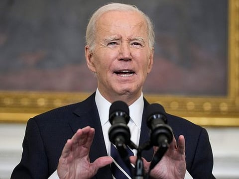 US President Joe Biden makes remarks after speaking by phone with Israeli Prime Minister Benjamin Netanyahu about the situation in Israel following Hamas' deadly attacks, from the State Dining Room at the White House in Washington, on October 10, 2023. 