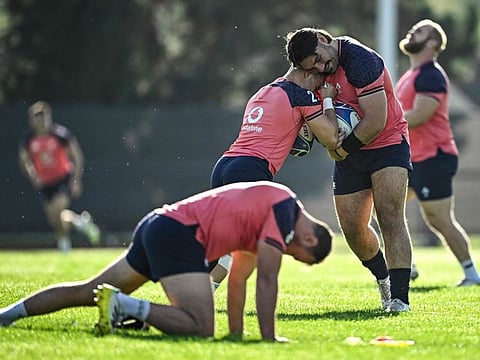 Irelands prop Tom O'Toole (right) takes part in a training session at Fauvettes Stadium, in Domont, north of Paris, on Wednesday.
