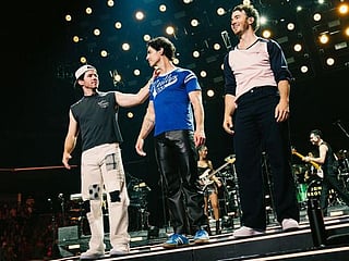 Watch: Pop singers Jonas Brothers perform with surprise guest on stage: Dad Kevin 