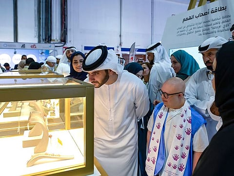 Sheikh Mansoor bin Mohammed bin Rashid Al Maktoum, Chairman of the Higher Committee for the Protection of the Rights of People of Determination, touring the expo