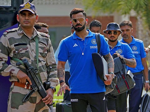 India's Virat Kohli arrives at Ahmedabad airport ahead of the match against Pakistan in the Cricket World Cup on Thursday.