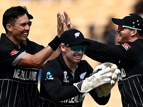 New Zealand's Trent Boult (left) celebrates with teammates after dismissing Bangladesh's Liton Das.