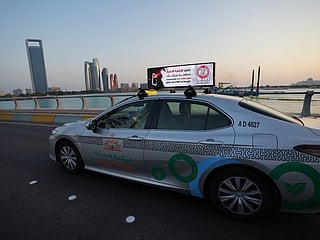 Messages from Abu Dhabi Police now on smart screens on taxi roofs