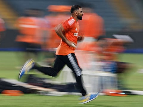 India's Mohammed Shami bowls during a practice session at the Maharashtra Cricket Association Stadium in Pune on October 17, 2023.  