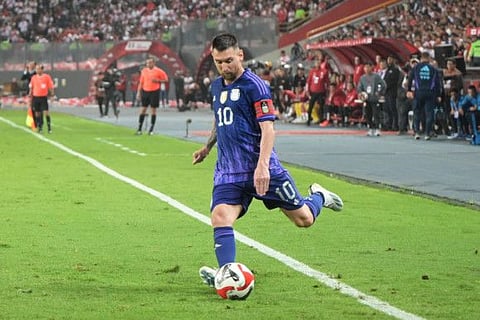 Argentina's forward Lionel Messi shoots the ball during the FIFA World Cup South American qualifier against Peru in Lima on Tuesday.