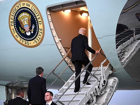 US President Joe Biden boards Air Force One at Ben Gurion International Airport following a solidarity visit to Israel, on October 18, 2023, amid the ongoing battles between Israel and the Hamas in the Gaza Strip.  