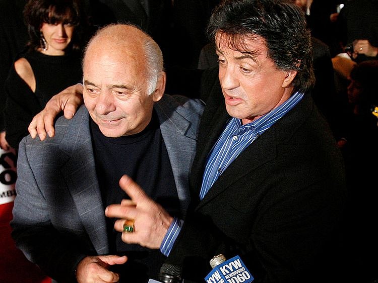 Actor Sylvester Stallone (R) stands with co-star Burt Young before the premiere of the film "Rocky Balboa" in Philadelphia, Pennsylvania, December 18, 2006. 
