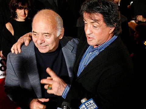 Actor Sylvester Stallone (R) stands with co-star Burt Young before the premiere of the film "Rocky Balboa" in Philadelphia, Pennsylvania, December 18, 2006. 