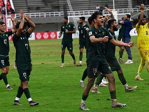 Pakistan's players celebrate their win at the 2026 Fifa World Cup qualifiers match against Cambodia, at the Jinnah Sports stadium in Islamabad on Thursday.