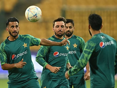 Pakistan's Hasan Ali plays football during a practice session on the eve of the Cricket World Cup match against Australia at the M Chinnaswamy Stadium in Bengaluru on Thursday.