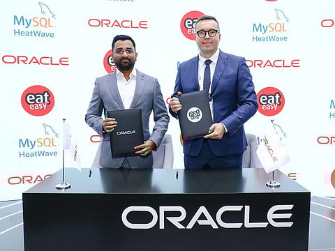 From Left to Right - Safarath Shafi, founder & CEO of EatEasy with Przemek Dominiak, Senior Director MySQL Heatwave