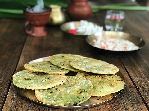 Karaishutir Kochuri or deep fried fluffy bread with spicy green peas filling