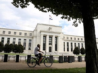 Fed flags concerns about inflation pressures and office market