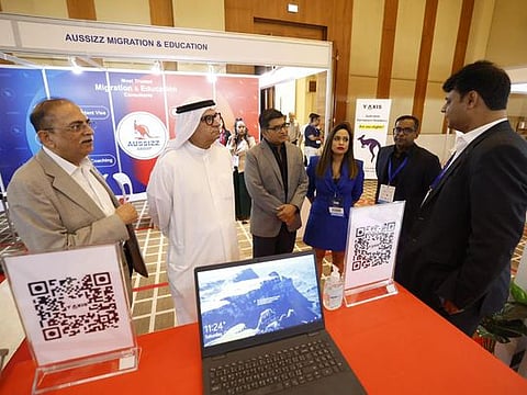 Naresh Bhaya, Director Finance; Abdul Hamid Ahmad, CEO, Editor-in-Chief & Executive Director Publications, Gulf News; Anshuman R. Joshi, Director - Sales & Publishing; Tina Bhakthavalsalan, Category Sales Manager; and David George, Publisher, Gulf News, interacting with exhibitors 