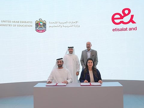 Eng. Mohammed Al Ali, Director of the Information Technology Department at the Ministry of Education, and Dena Almansoori, Group Chief Human Resources Officer at e&, signed the MoU in the presence of Dr. Mohamed Al-Mualla, Undersecretary of the Ministry of Education for Academic Affairs, and Hatem Dowidar, GCEO, e&.
