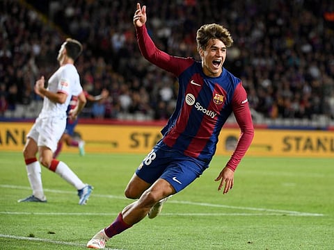 Barcelona's forward Marc Guiu celebrates after scoring his team's first goal during the Spanish league match against Athletic Club Bilbao at the Estadi Olimpic Lluis Companys in Barcelona on Sunday.