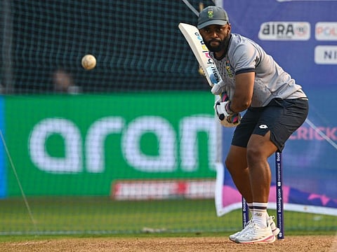 South Africa's captain Temba Bavuma bats in the nets during a practice session on the eve of their World Cup match against Bangladesh at the Wankhade Stadium in Mumbai on Monday.