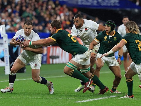 England's scrum-half Danny Care (left) is tackled by South Africa's back row Kwagga Smith during the Rugby World Cup semi-finals in Saint-Denis. World Rugby approved 24 teams for the 2027 Rugby World Cup in Australia, the first expansion of the tournament since 1999.
