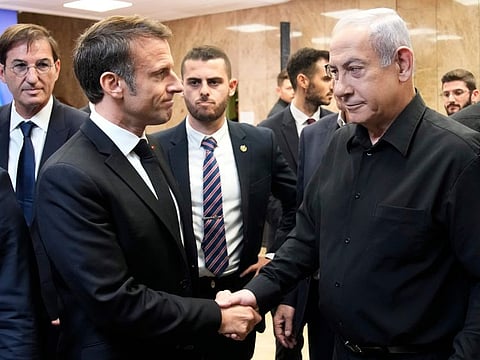 Netanyahu and Macron after a joint press conference in Jerusalem, on October 24, 2023.  