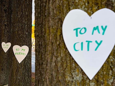 Hearts with messages are hung all over the downtown area in Lewiston, Maine on October 26, 2023, in the aftermath of a mass shootings. 