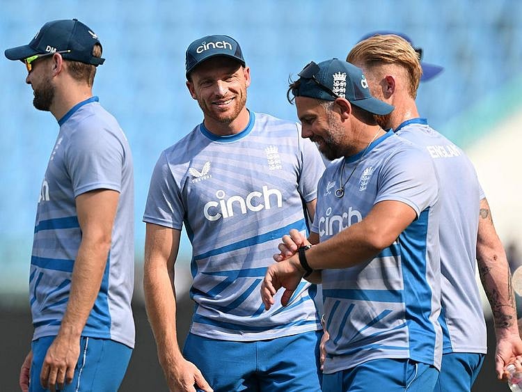 England's captain Jos Buttler (2nd left) along with teammates attends a practice session 