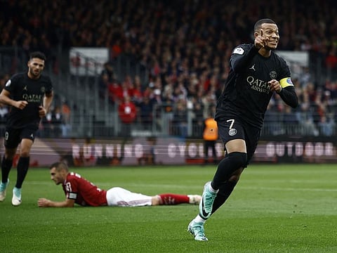 Paris St Germain's Kylian Mbappe celebrates scoring their second goal against Brest during a Ligue 1 match at Stade Francis-Le Ble, Brest, France, on Sunday
