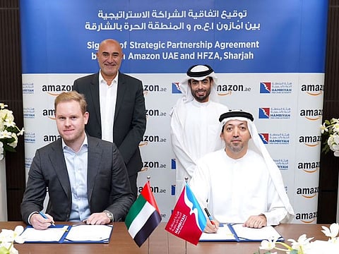 Officials from Hamriyah Free Zone Authority and Amazon UAE sign lease for new logistics centre  