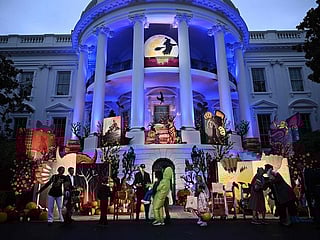 Photos: US President Joe Biden and Jill Biden host thousands for rainy Halloween trick or treating
