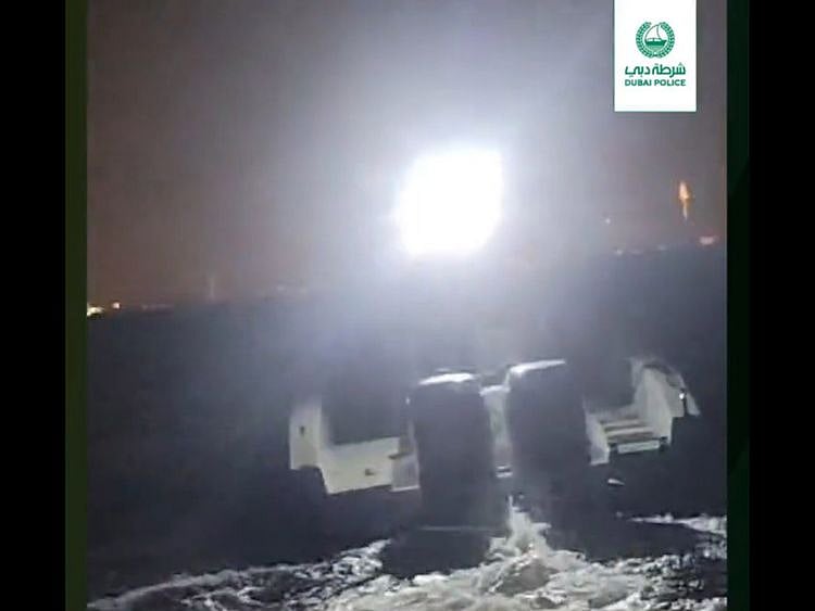 still-from-dubai-police-video-showing-boat-rescue-1698753335986