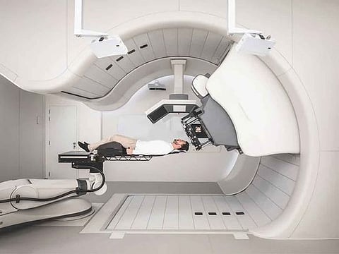 Proton therapy is a form of radiotherapy that employs protons instead of X-rays to painlessly eliminate cancer cells. It is hailed as one of the most significant projects within the healthcare sector, offering hope to cancer patients.