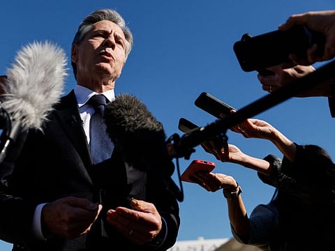 US Secretary of State Antony Blinken talks to reporters prior to boarding his aircraft at Joint Base Andrews in Maryland, on his way to the Middle East and Asia on November 2, 2023.  