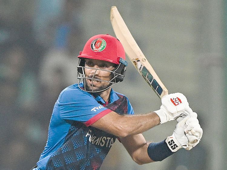 Afghanistan's Rahmat Shah plays a shot 