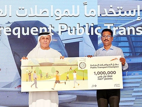 Mohamed Thalangara Aboobaker being honoured by Mattar Al Tayer with one million nol Plus points.