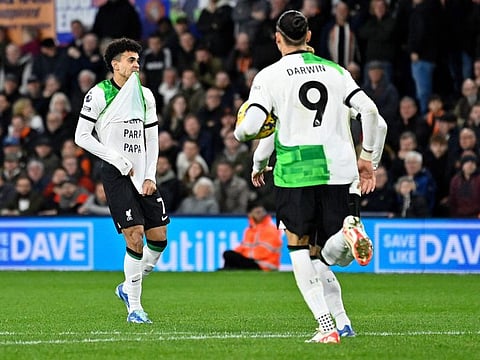 Liverpool's Colombian midfielder Luis Diaz celebrates after scoring the equalising goal during the Premier League football against Luton Town at Kenilworth Road in Luton, north of London on Sunday.