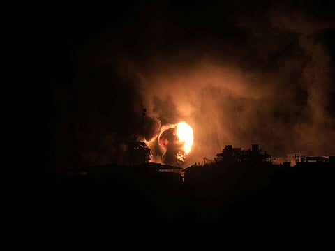 Smoke and flames rise during Israeli strike, amid the ongoing conflict between Israel and Palestinian Islamist group Hamas, in Gaza City.