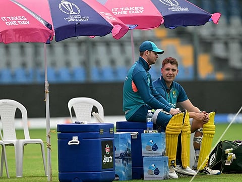 Australia's Steve Smith (left) and Cameron Green have a chat during a practice session  at the Wankhede Stadium in Mumbai on Monday.