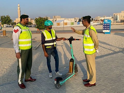 Dubai Police honours responsible drivers 'Scooter Hero' with pin.