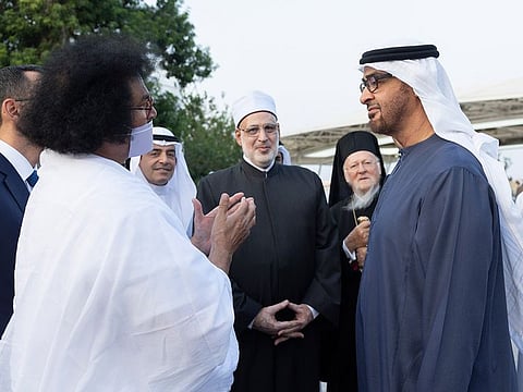 President His Highness Sheikh Mohamed bin Zayed Al Nahyan (right) speaks with a participant of the Global Faith Leaders’ Summit on Climate Action, during a Sea Palace barza on Tuesday