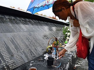 Photos: Philippine typhoon survivors pray for victims on 10th anniversary